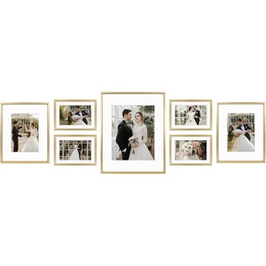 image:imageGolden State Art Aluminum Gallery Wall Frame Set of 7  Includes One 11x14 Two 8x10 and Four 5x7  Metal Frames with Mat amp Real Glass Cover for Elegant Home or Office Decor Style 2 GoldGold