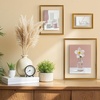 image:imageFrametory Floating Picture Frames Set  Bronze Metal Photo Frames  Real Glass  Display One 11x14 Two 8x10 and Four 5x7 Inch Photos for Home DecorationBronze