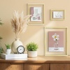 image:imageFrametory Floating Picture Frames Set  Bronze Metal Photo Frames  Real Glass  Display One 11x14 Two 8x10 and Four 5x7 Inch Photos for Home DecorationGold