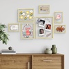 image:imageFrametory Floating Picture Frames Set  Bronze Metal Photo Frames  Real Glass  Display One 11x14 Two 8x10 and Four 5x7 Inch Photos for Home DecorationGold