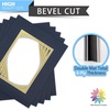 image:imageMat Board Center 5 Pack 11x14 Double Mat for 85x11 Photos Off WhiteGold  Off White Over Gold Double Mat Board Acid Free 8Ply Thickness White Core Bevel Cut for Photos amp Art FramingBlue Over Gold