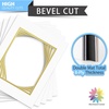 image:imageMat Board Center 5 Pack 11x14 Double Mat for 85x11 Photos Off WhiteGold  Off White Over Gold Double Mat Board Acid Free 8Ply Thickness White Core Bevel Cut for Photos amp Art FramingOff White Over Gold