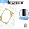 image:imageMat Board Center 5 Pack 11x14 Double Mat for 85x11 Photos Off WhiteGold  Off White Over Gold Double Mat Board Acid Free 8Ply Thickness White Core Bevel Cut for Photos amp Art FramingOff White Over Gold