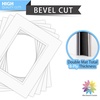 image:imageMat Board Center 5 Pack 11x14 Double Mat for 85x11 Photos Off WhiteGold  Off White Over Gold Double Mat Board Acid Free 8Ply Thickness White Core Bevel Cut for Photos amp Art FramingOff White Over Off White